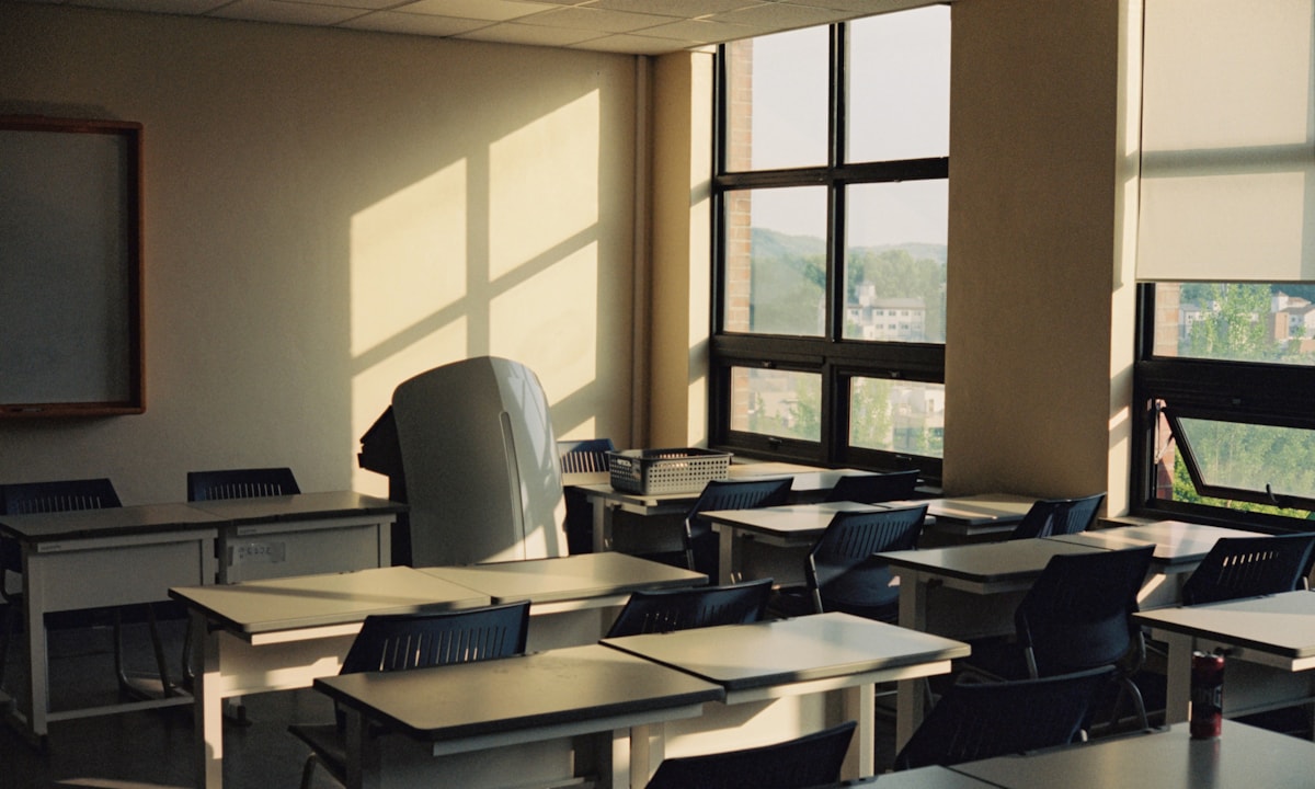 Classroom with desks and computer screens